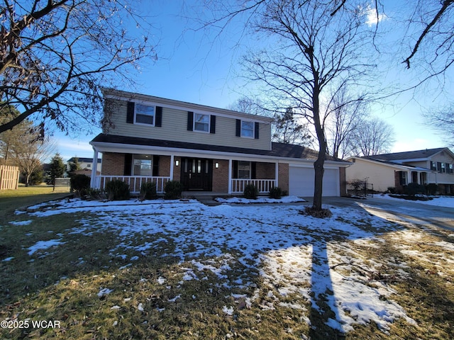 front facade featuring a porch and a garage