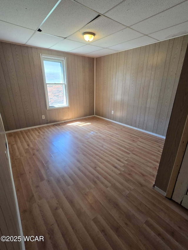 939 N W St, Lima, OH 45801 - empty room with a paneled ceiling and wood finished floors