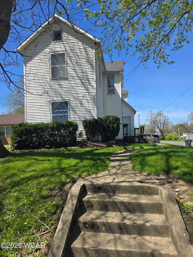 939 N W St, Lima, OH 45801 - view of home's exterior featuring a yard