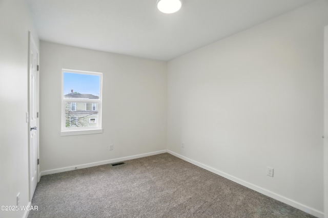 221 S Broadway St, Spencerville, OH 45887 - carpeted empty room featuring baseboards