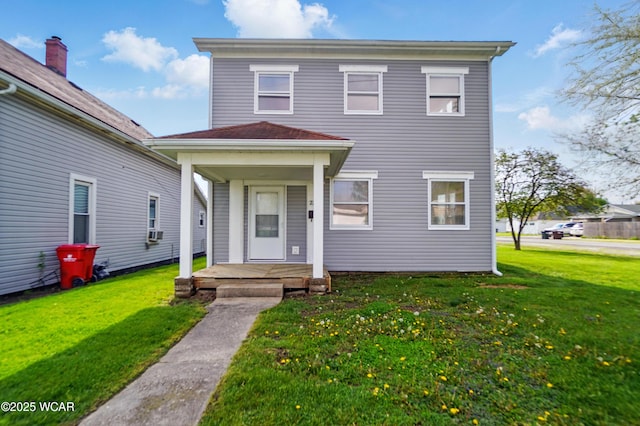 221 S Broadway St, Spencerville, OH 45887 - view of front of home with a front yard and cooling unit