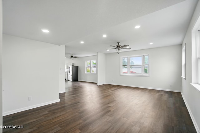 221 S Broadway St, Spencerville, OH 45887 - unfurnished living room with recessed lighting, dark wood-style floors, and a ceiling fan
