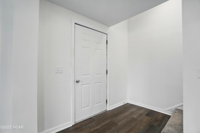 221 S Broadway St, Spencerville, OH 45887 - unfurnished room featuring dark wood-style flooring and baseboards
