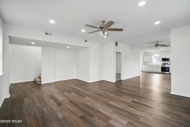221 S Broadway St, Spencerville, OH 45887 - unfurnished living room featuring ceiling fan, recessed lighting, stairway, and dark wood-style flooring