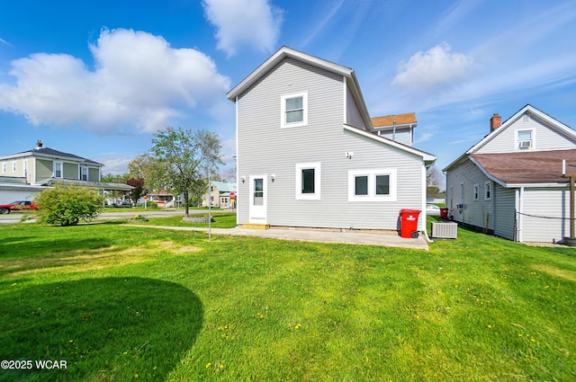 221 S Broadway St, Spencerville, OH 45887 - rear view of house featuring a yard and a patio