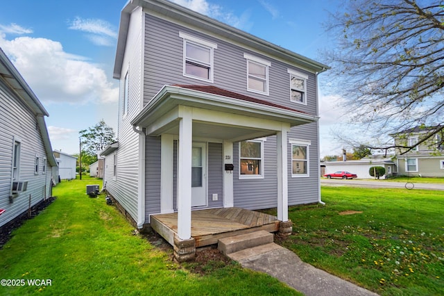 221 S Broadway St, Spencerville, OH 45887 - view of front of house with a front yard and cooling unit