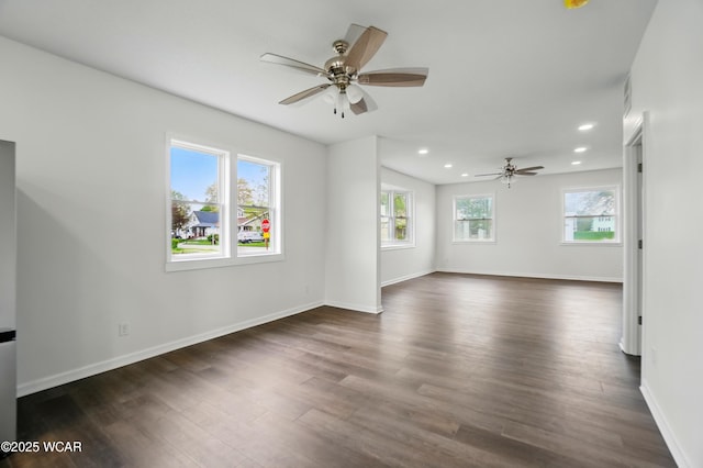 221 S Broadway St, Spencerville, OH 45887 - unfurnished room featuring ceiling fan, dark wood finished floors, and recessed lighting