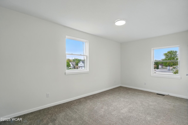 221 S Broadway St, Spencerville, OH 45887 - empty room with carpet and baseboards
