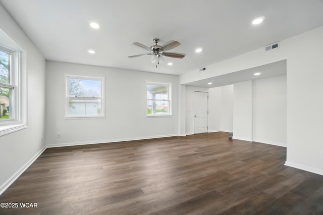221 S Broadway St, Spencerville, OH 45887 - unfurnished room with ceiling fan, recessed lighting, and dark wood-style flooring