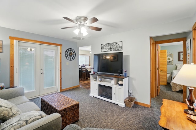carpeted living room featuring baseboards, a ceiling fan, french doors, and visible vents