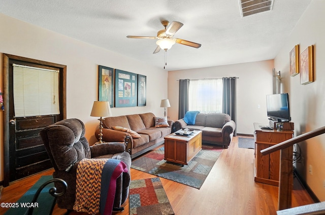 18698 Rd 48, Grover Hill, OH 45849 - living room featuring a ceiling fan and wood finished floors