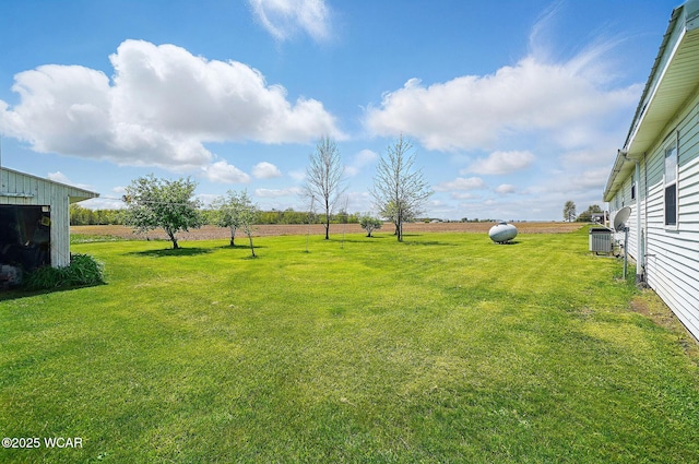 18698 Rd 48, Grover Hill, OH 45849 - view of grassy yard with cooling unit and a view of countryside