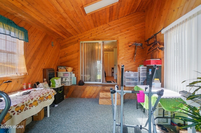 18698 Rd 48, Grover Hill, OH 45849 - carpeted bedroom featuring wood walls, a skylight, and vaulted ceiling