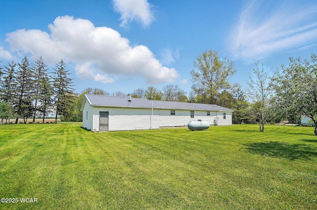 18698 Rd 48, Grover Hill, OH 45849 - back of property with a yard and metal roof