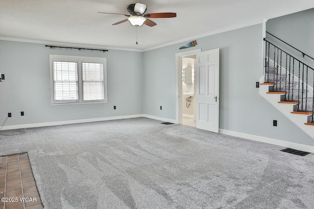 unfurnished room featuring crown molding, ceiling fan, and carpet flooring