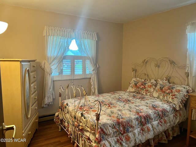 1121 Bahama Dr, Lima, OH 45801 - bedroom with wood finished floors and a baseboard heating unit