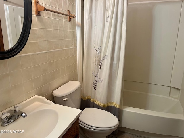 1121 Bahama Dr, Lima, OH 45801 - full bathroom with toilet, shower / bath combination with curtain, vanity, and tile walls