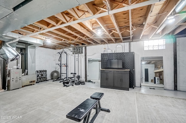 exercise area featuring heating unit