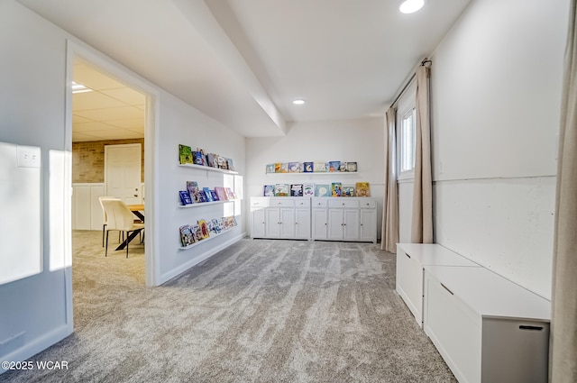 bedroom with recessed lighting, a paneled ceiling, baseboards, and light carpet