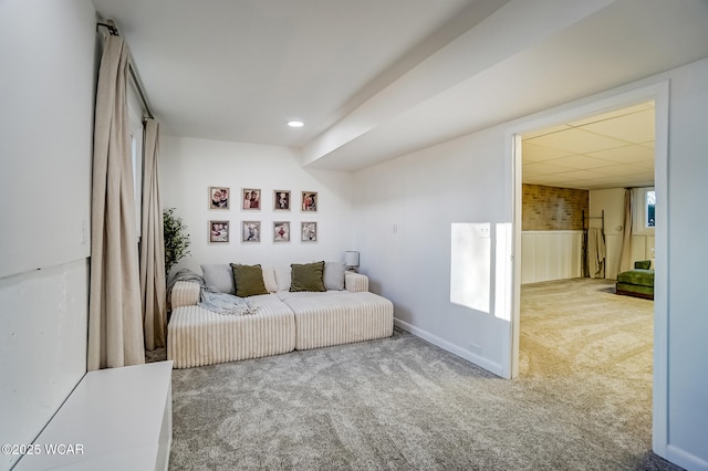 carpeted bedroom with a drop ceiling and recessed lighting