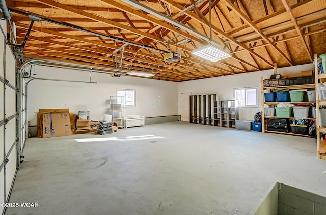 garage featuring a garage door opener