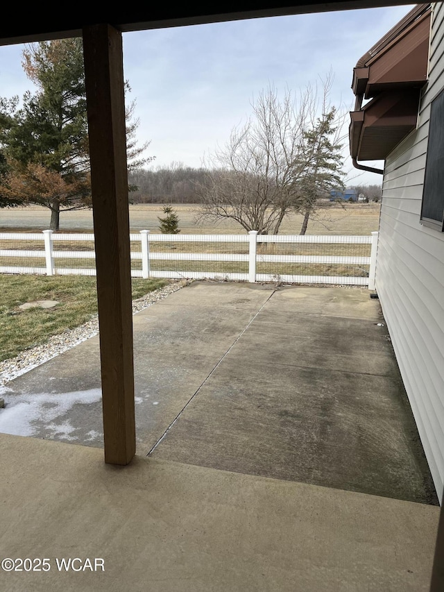 view of patio / terrace featuring a rural view