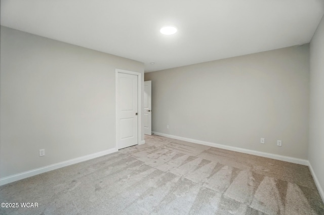 1291 Madison Blvd, Van Wert, OH 45891 - spare room with baseboards and light carpet