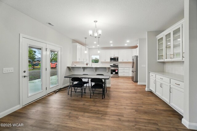 1291 Madison Blvd, Van Wert, OH 45891 - dining room with visible vents, baseboards, an inviting chandelier, recessed lighting, and dark wood-type flooring