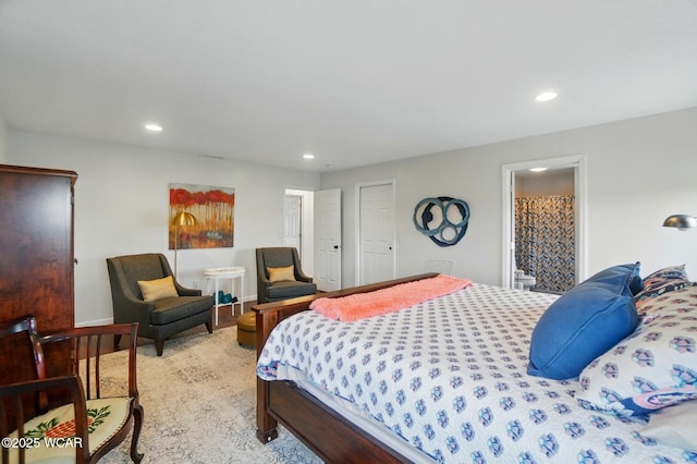 bedroom with recessed lighting and connected bathroom