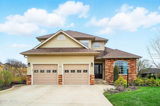 craftsman-style house featuring roof with shingles, an attached garage, concrete driveway, and stone siding