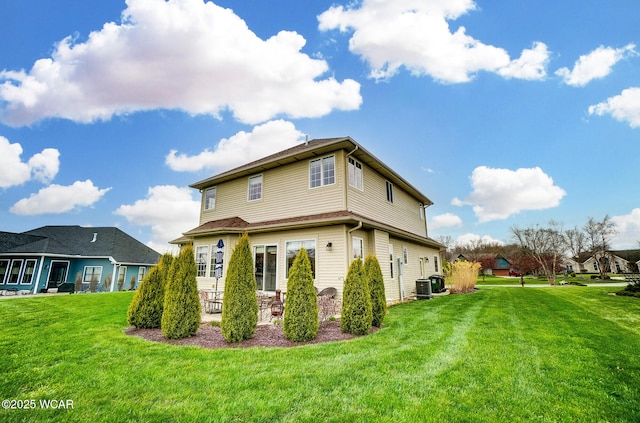 back of property featuring a patio, a yard, and cooling unit