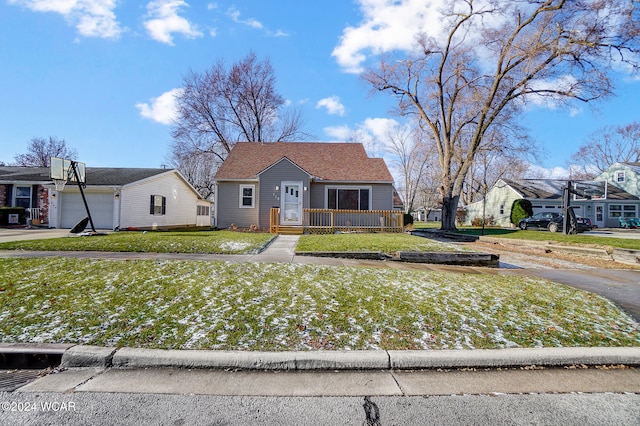 view of front facade with a garage and a front yard