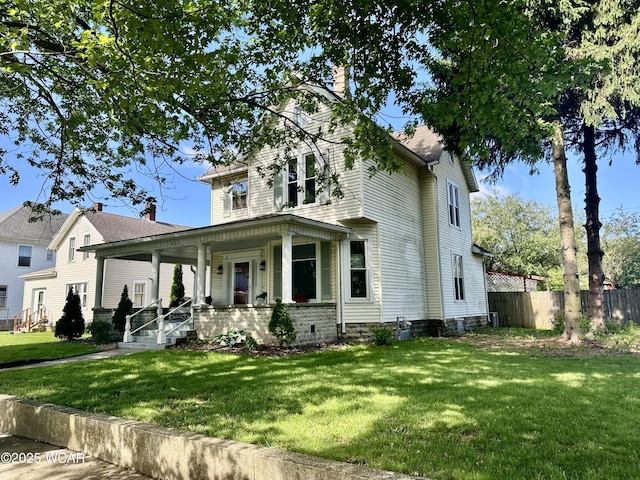 827 N Main St, Fostoria, OH 44830 - view of front of home with covered porch