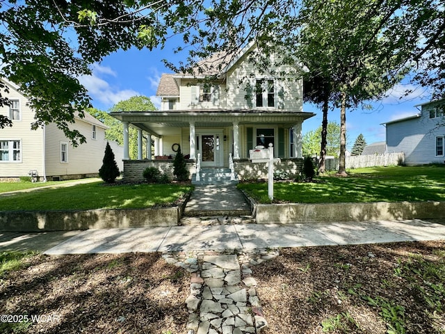 827 N Main St, Fostoria, OH 44830 - view of front of house with covered porch