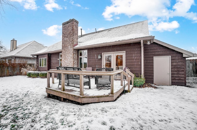 view of snow covered property