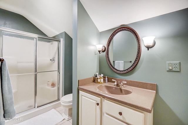 bathroom featuring lofted ceiling, an enclosed shower, vanity, and tile patterned flooring