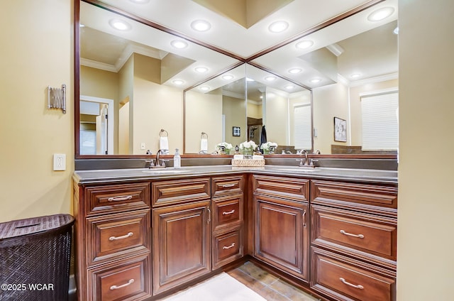 bathroom featuring ornamental molding, vanity, and tile patterned flooring