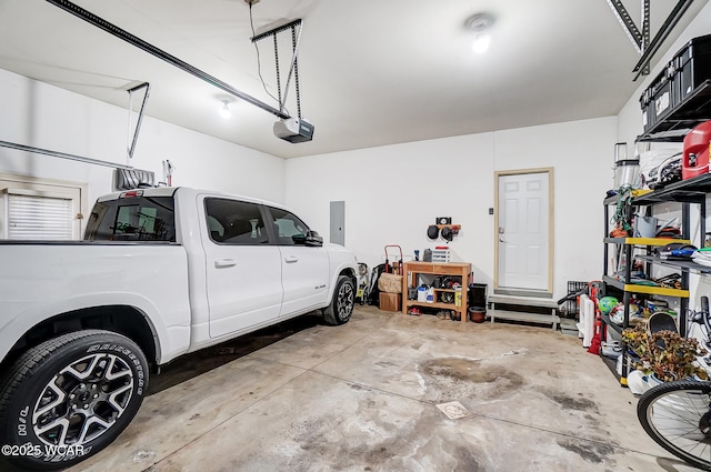 garage featuring a garage door opener