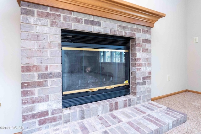 81 Riley Creek Ct, Bluffton, OH 45817 - detailed view of a brick fireplace and carpet flooring