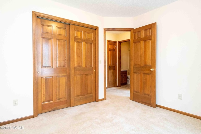81 Riley Creek Ct, Bluffton, OH 45817 - unfurnished bedroom with light carpet and a closet