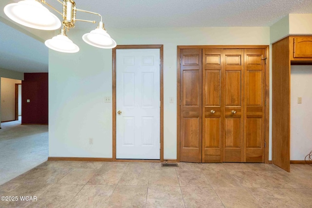 81 Riley Creek Ct, Bluffton, OH 45817 - unfurnished bedroom featuring baseboards and a closet