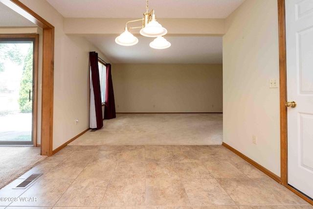 81 Riley Creek Ct, Bluffton, OH 45817 - spare room featuring light carpet and a chandelier