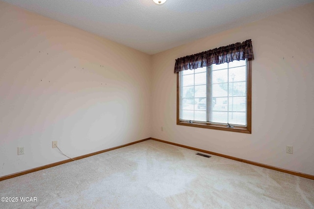 81 Riley Creek Ct, Bluffton, OH 45817 - carpeted empty room featuring baseboards