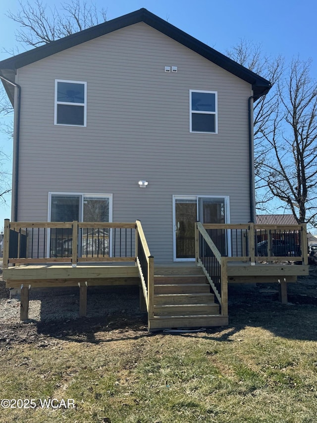 rear view of house with a deck