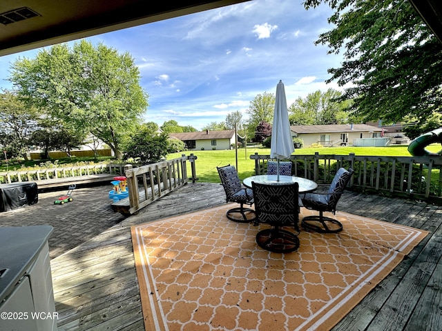 2969 Sands Rd, Lima, OH 45805 - deck with outdoor dining space and a lawn