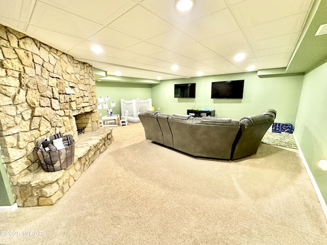 2969 Sands Rd, Lima, OH 45805 - living room featuring a paneled ceiling, baseboards, carpet, a stone fireplace, and recessed lighting