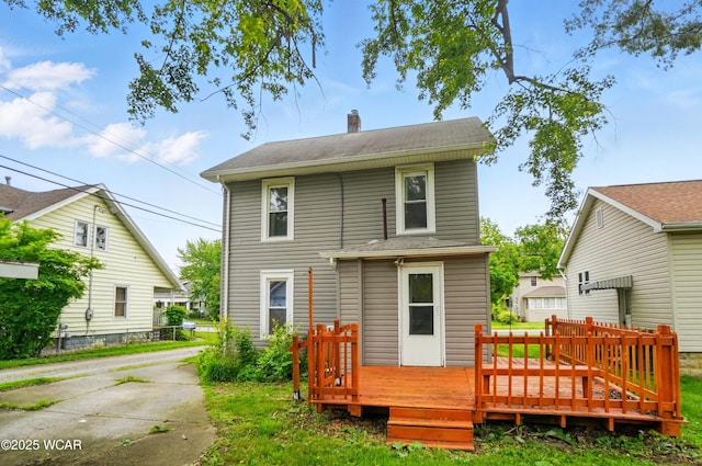 219 W O Connor Ave, Lima, OH 45801 - back of property featuring a deck and a chimney