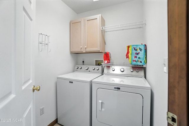 556 Westerly Dr, Lima, OH 45805 - laundry area featuring washing machine and dryer and cabinet space
