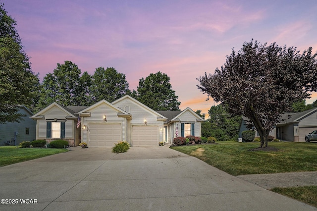 556 Westerly Dr, Lima, OH 45805 - ranch-style home featuring an attached garage, a lawn, and driveway