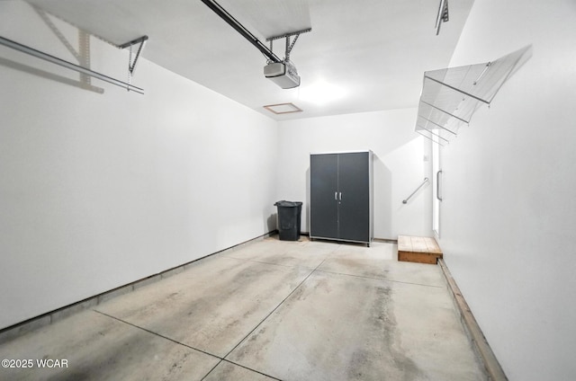 556 Westerly Dr, Lima, OH 45805 - garage featuring a garage door opener